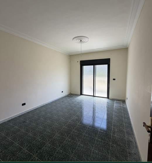 Bedroom with balcony access, apartment for sale in Dohat El Hoss — Ref. 1187
