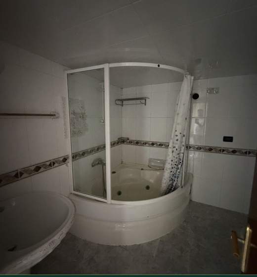 Bathroom with jacuzzi tub and glass shower, apartment for sale in Dohat El Hoss — Ref. 1187