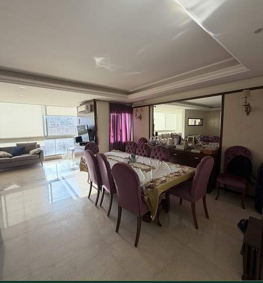 Salon and dining area of apartment for sale in Ras El Nabeh, Beirut — Ref. 1179