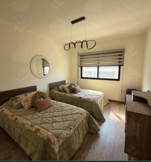 Twin bedroom with two single beds and a window over the street, apartment for sale in Zarif, Beirut — Ref. 1195