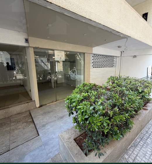Glazed shopfront from the street, with a planted bed alongside the entrance, shop for rent in Sodeco, Achrafieh — Ref. 1199