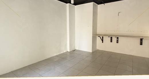 Tiled 20 m² commercial shop with wall brackets and pendant lighting, shop for rent in Mar Mikhael, Beirut — Ref. 1193